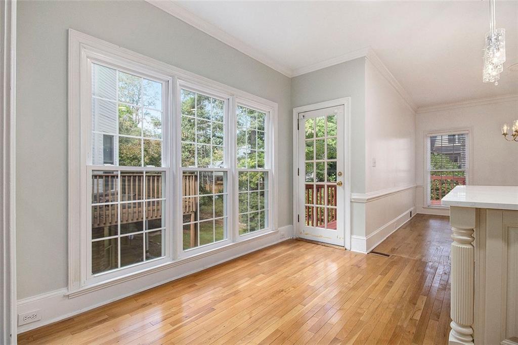 2520 Summeroak Drive Tucker, GA 30084 - Photo 13 of 37 a view of an empty room with a window and wooden floor