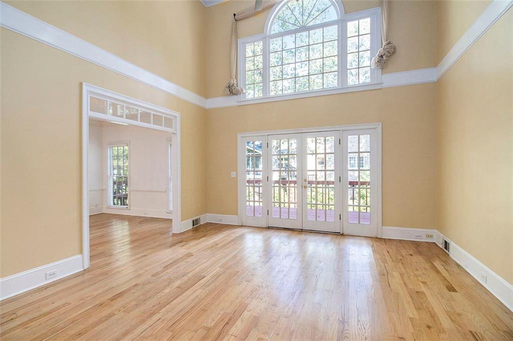2520 Summeroak Drive Tucker, GA 30084 - Photo 14 of 37 wooden floor in an empty room with a window