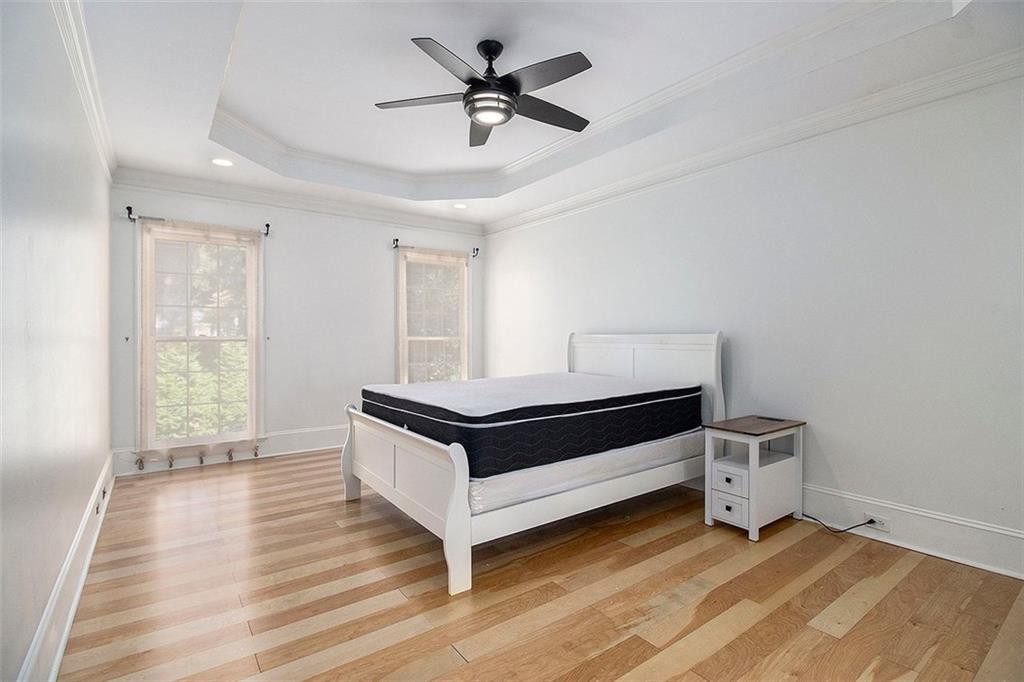 2520 Summeroak Drive Tucker, GA 30084 - Photo 18 of 37 a living room with a bed furniture and a window