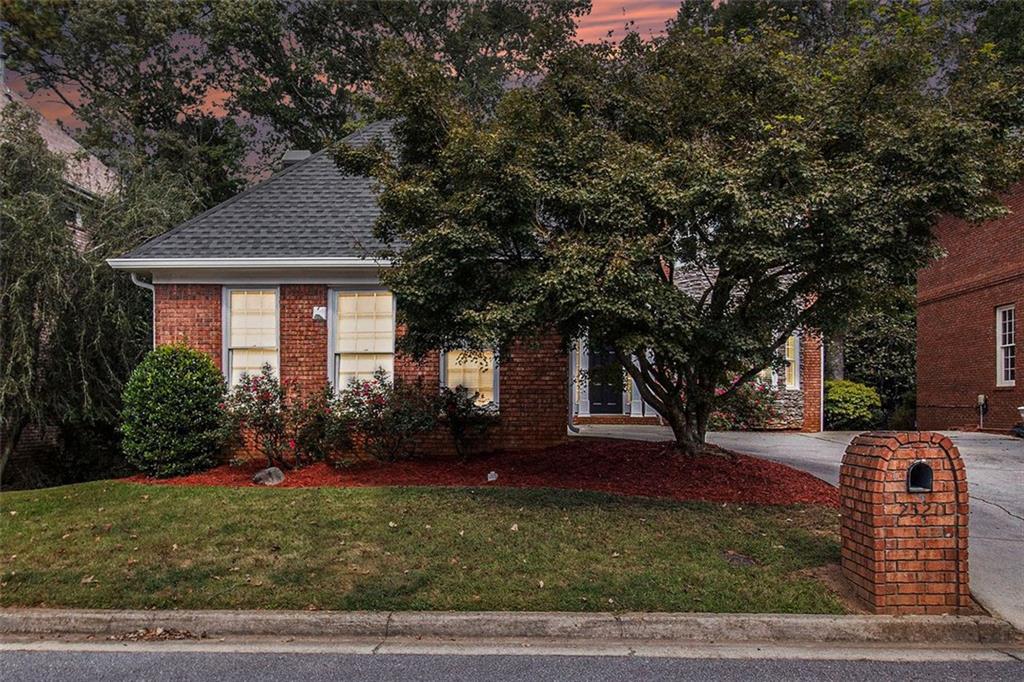 2520 Summeroak Drive Tucker, GA 30084 - Photo 2 of 37 a front view of a house with garden