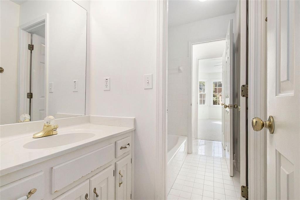 2520 Summeroak Drive Tucker, GA 30084 - Photo 23 of 37 a bathroom with a sink and a mirror