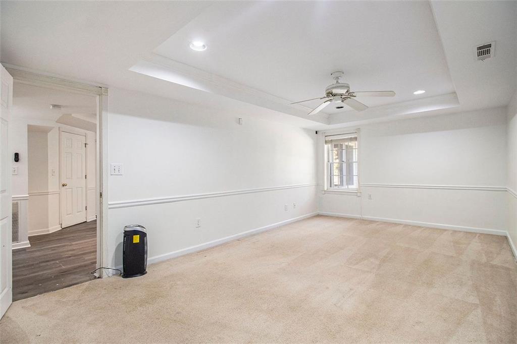 2520 Summeroak Drive Tucker, GA 30084 - Photo 29 of 37 wooden floor in an empty room with a window