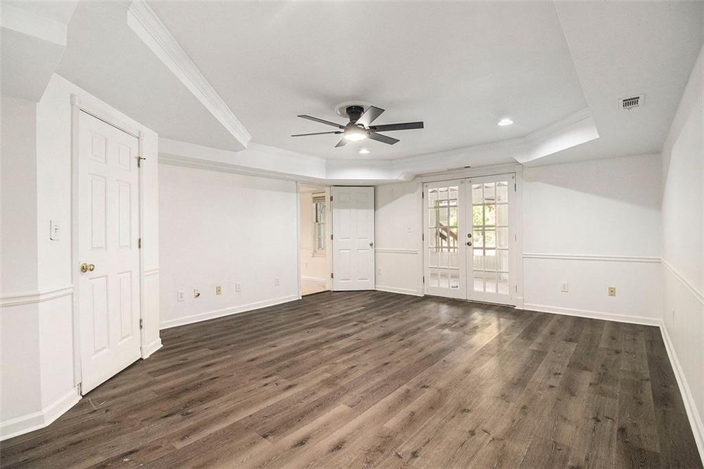 2520 Summeroak Drive Tucker, GA 30084 - Photo 32 of 37 wooden floor in an empty room with a window