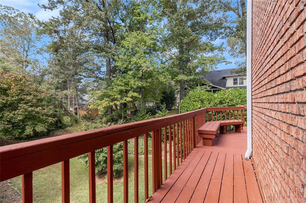 2520 Summeroak Drive Tucker, GA 30084 - Photo 35 of 37 a view of balcony with wooden floor and fence