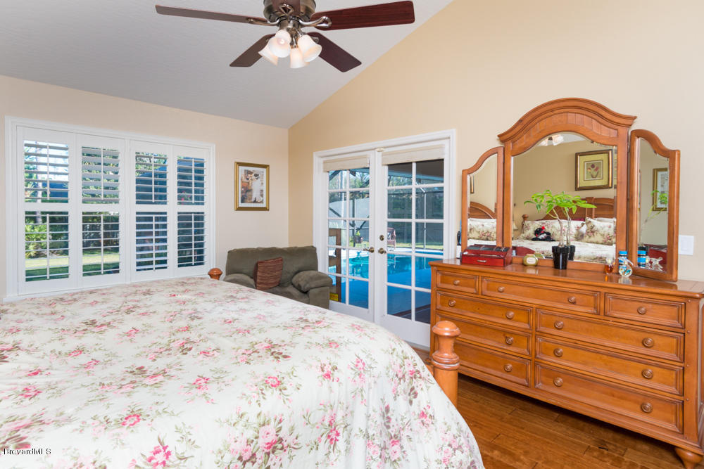 4696 Canard Road Melbourne, FL 32934 - Photo 13 of 19 VIEW OF POOL FROM MASTER BEDROOM