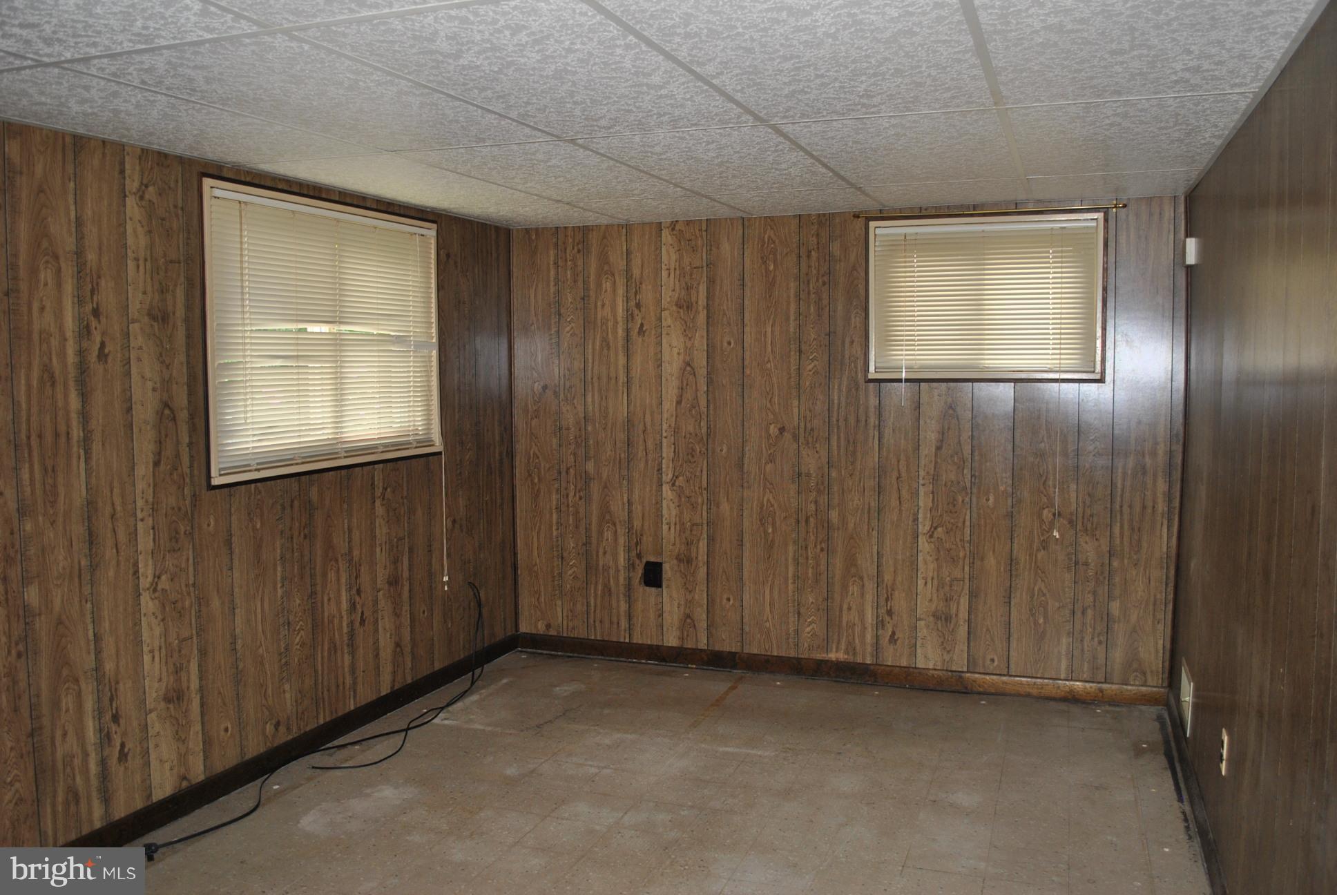 1027 Lakemont Road Baltimore, MD 21228 - Photo 12 of 14 a view of an empty room with a window