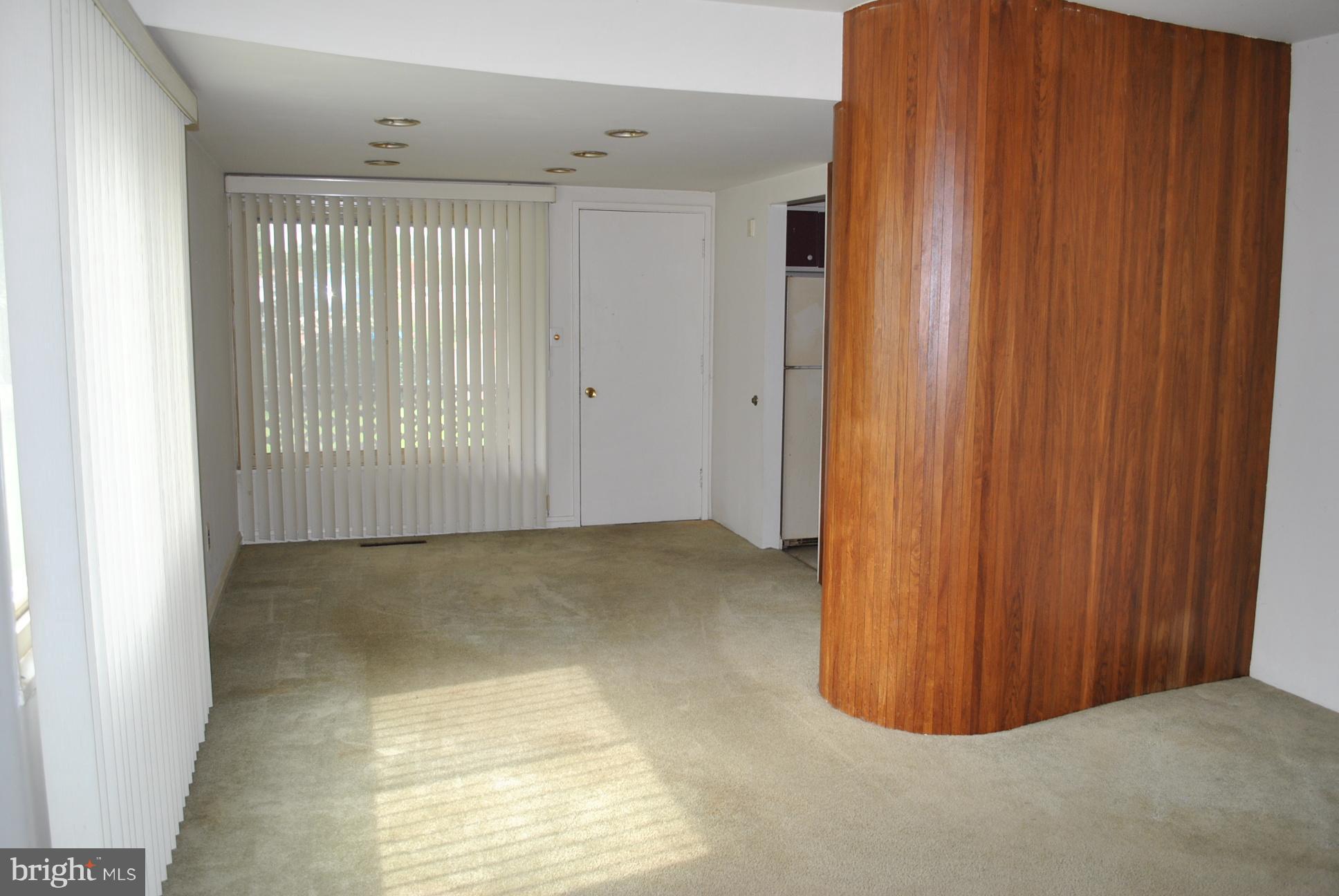 1027 Lakemont Road Baltimore, MD 21228 - Photo 6 of 14 a view of an empty room