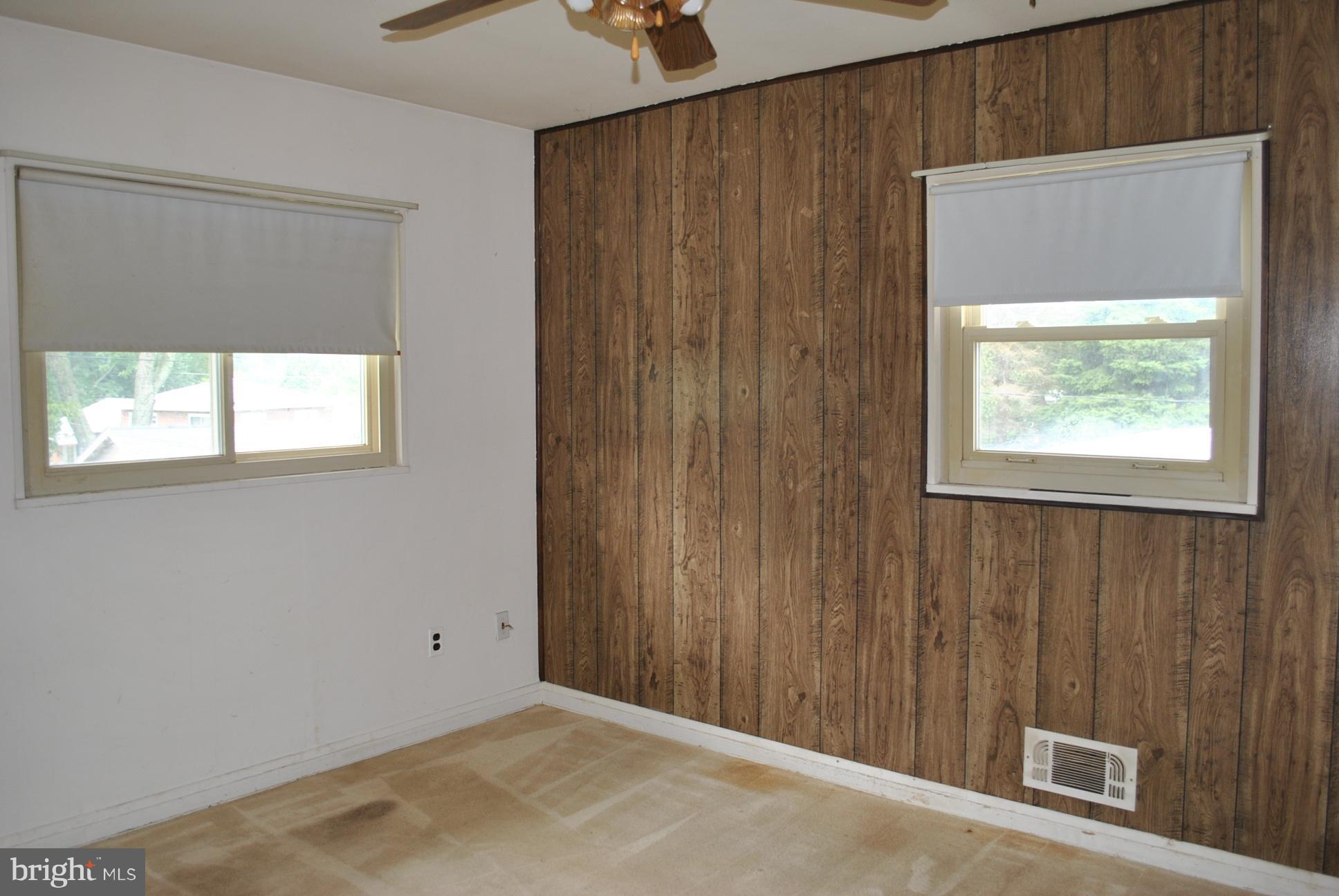 1027 Lakemont Road Baltimore, MD 21228 - Photo 10 of 14 an empty room with windows