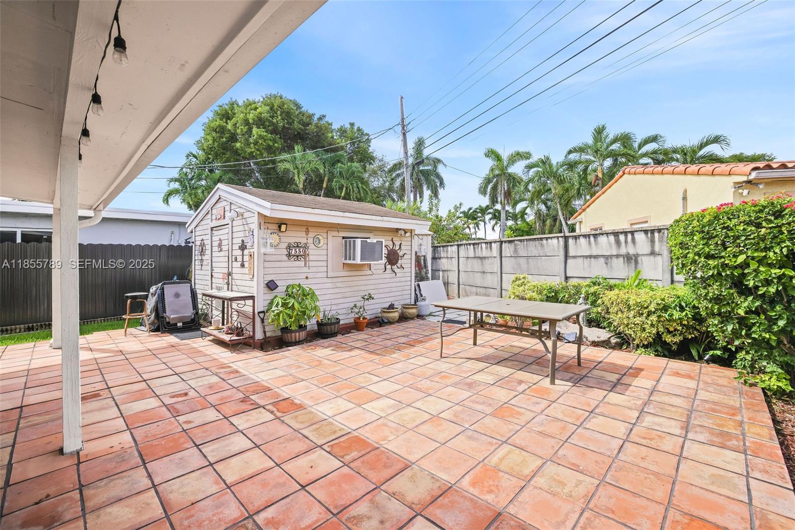7550 Southwest 28th Street Road Miami, FL 33155 - Photo 20 of 27 a view of a terrace with sitting area
