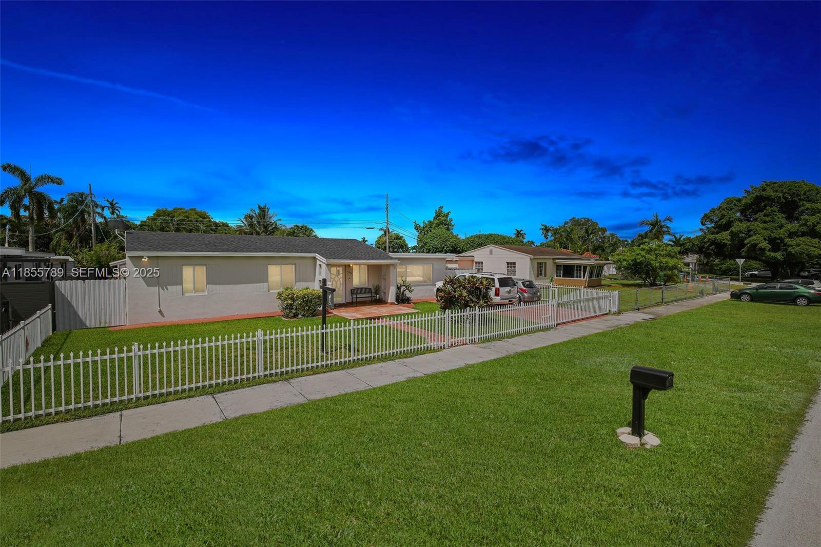 7550 Southwest 28th Street Road Miami, FL 33155 - Photo 2 of 27 a view of a house with a yard