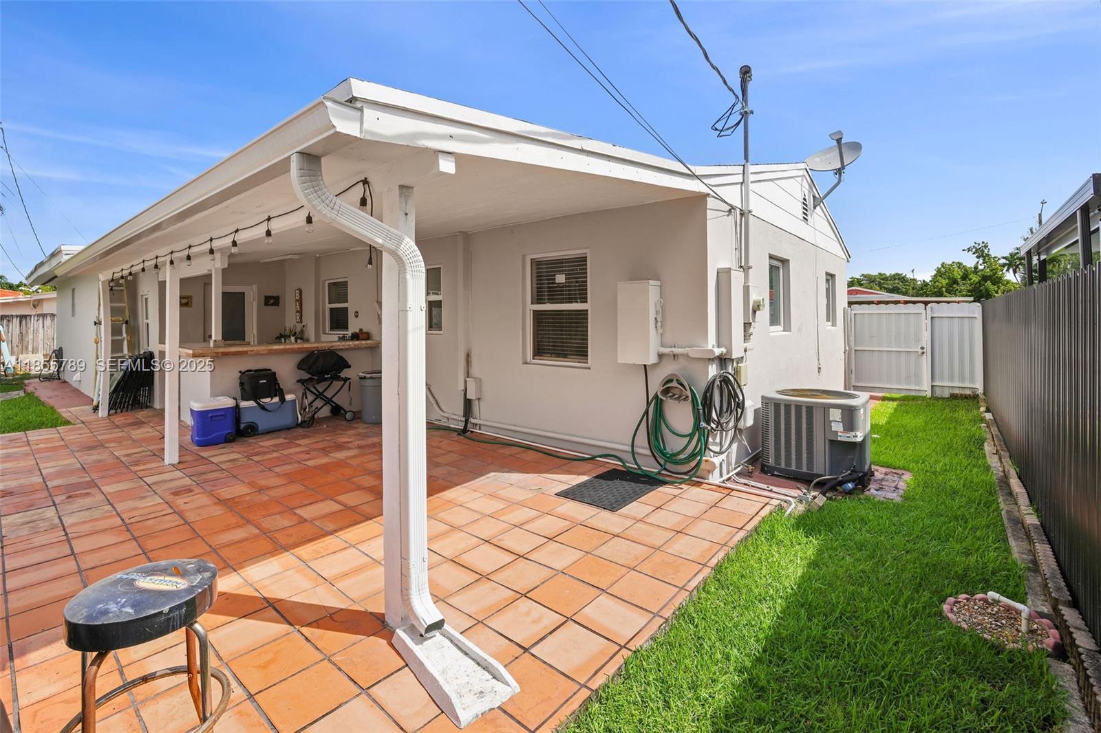 7550 Southwest 28th Street Road Miami, FL 33155 - Photo 21 of 27 a view of a house with backyard