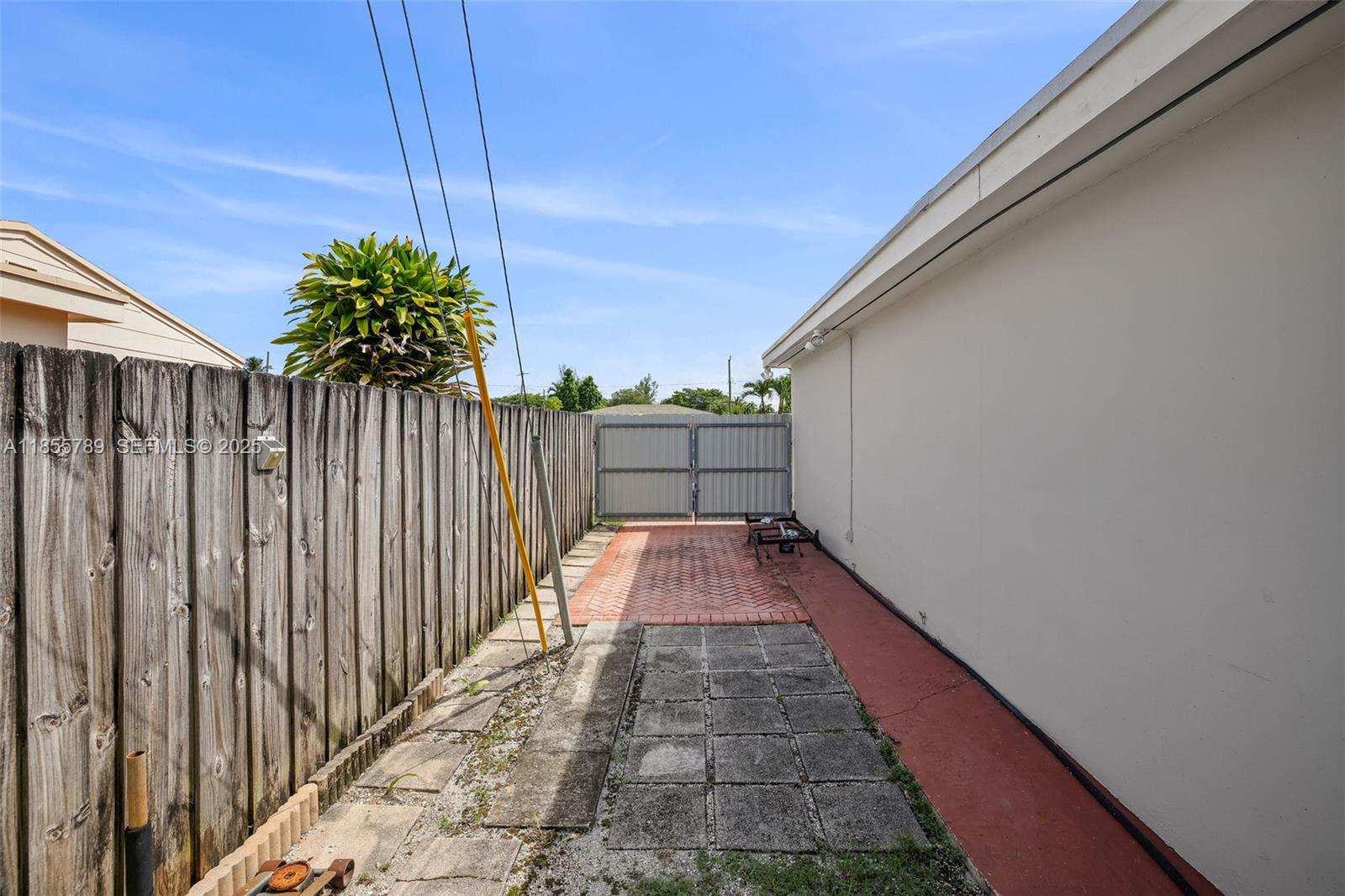 7550 Southwest 28th Street Road Miami, FL 33155 - Photo 24 of 27 a view of balcony with wooden floor and fence