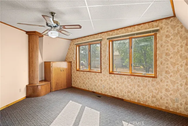 a view of a livingroom with furniture