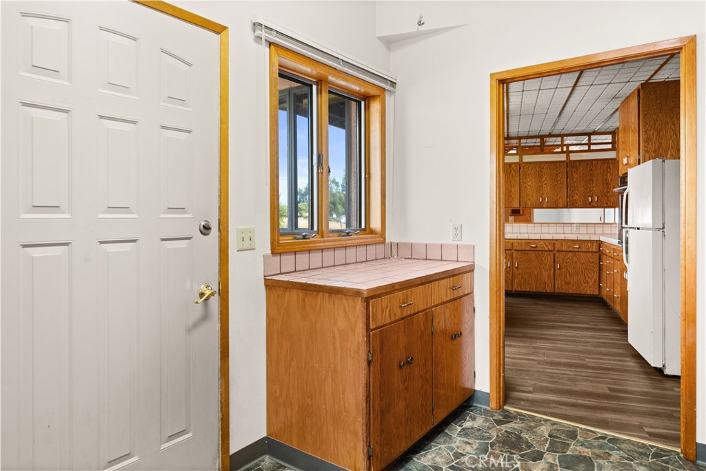 4345 Hall Road Corning, CA 96021 - Photo 29 of 52 a view of walk in closet with wooden floor