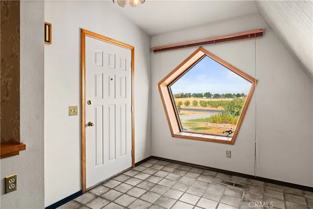 an empty room with windows