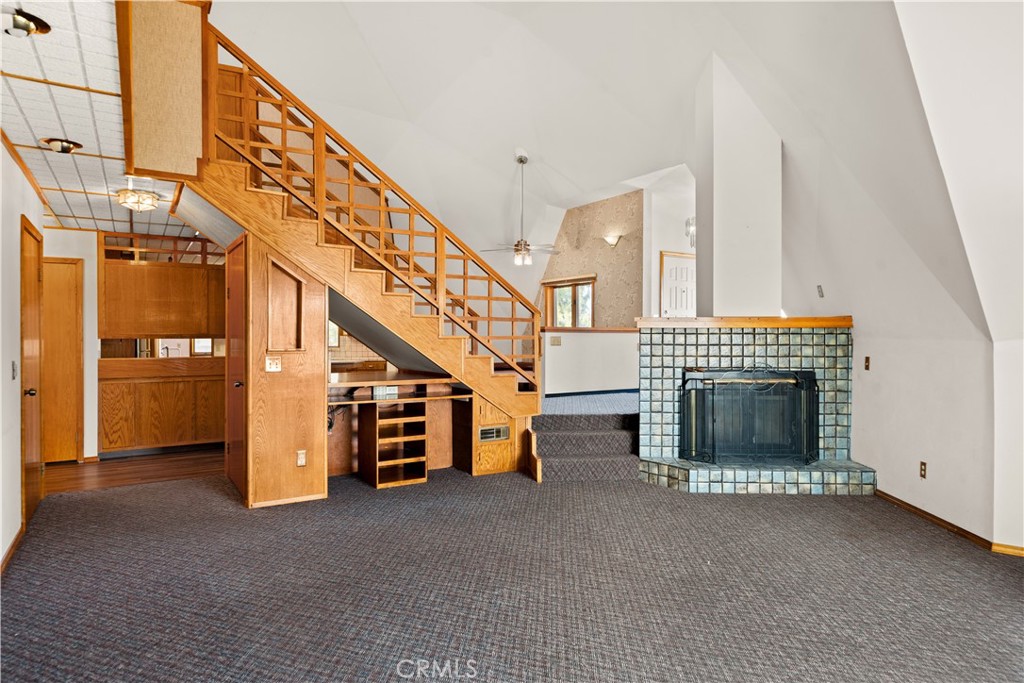 4345 Hall Road Corning, CA 96021 - Photo 6 of 52 a view of a livingroom with furniture and staircase