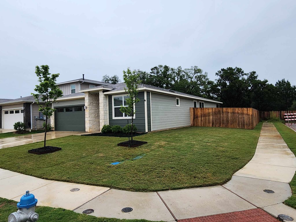 289 Century Plant Road Leander, TX 78641 - Photo 1 of 1 a view of a house with backyard and trees