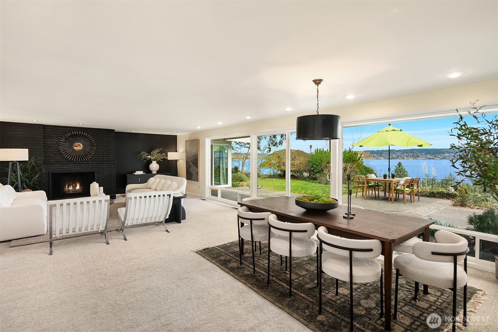 6555 Northeast Windermere Road Seattle, WA 98105 - Photo 11 of 38 a living room with furniture and a large window