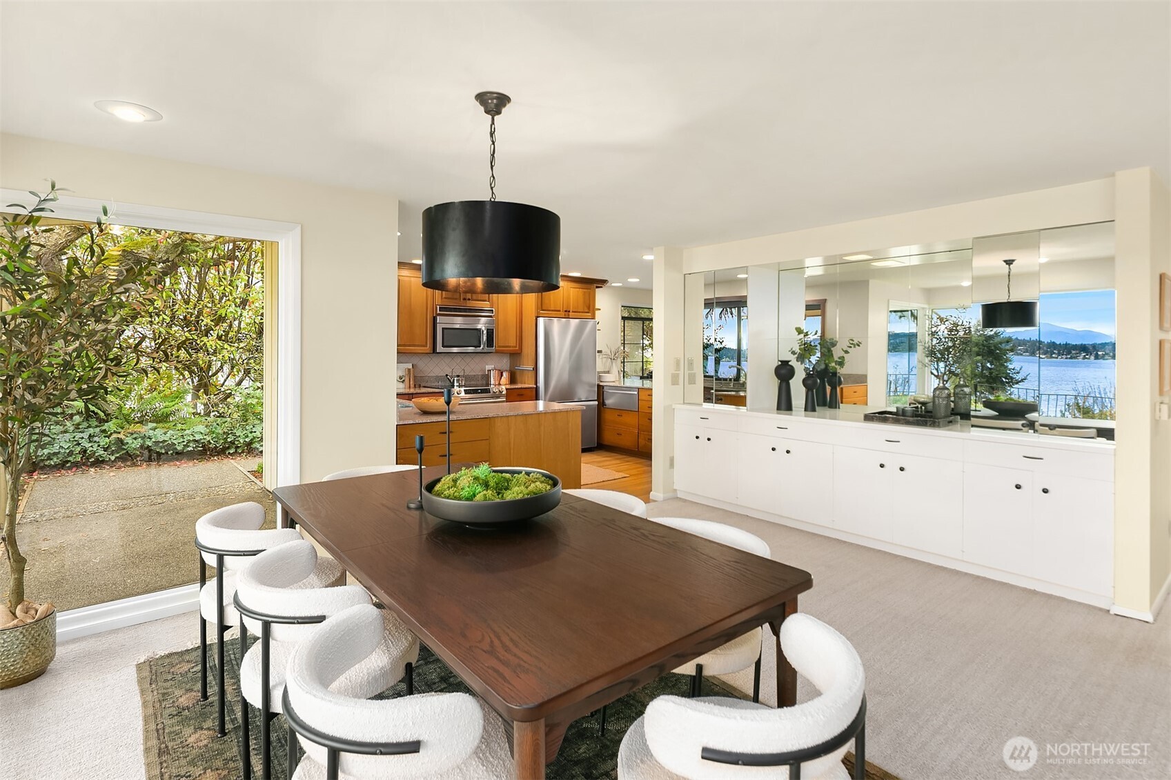 6555 Northeast Windermere Road Seattle, WA 98105 - Photo 12 of 38 a kitchen with a table and chairs