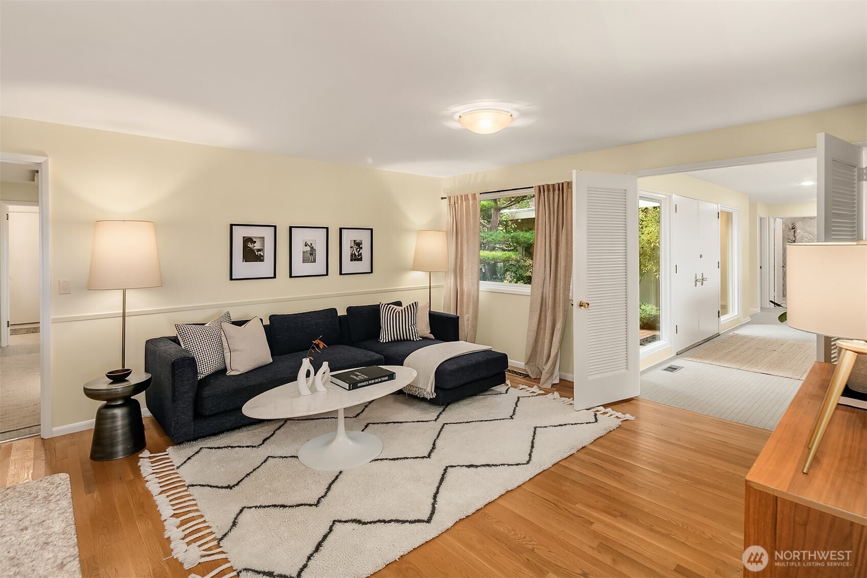 6555 Northeast Windermere Road Seattle, WA 98105 - Photo 17 of 38 a living room with furniture and a lamp