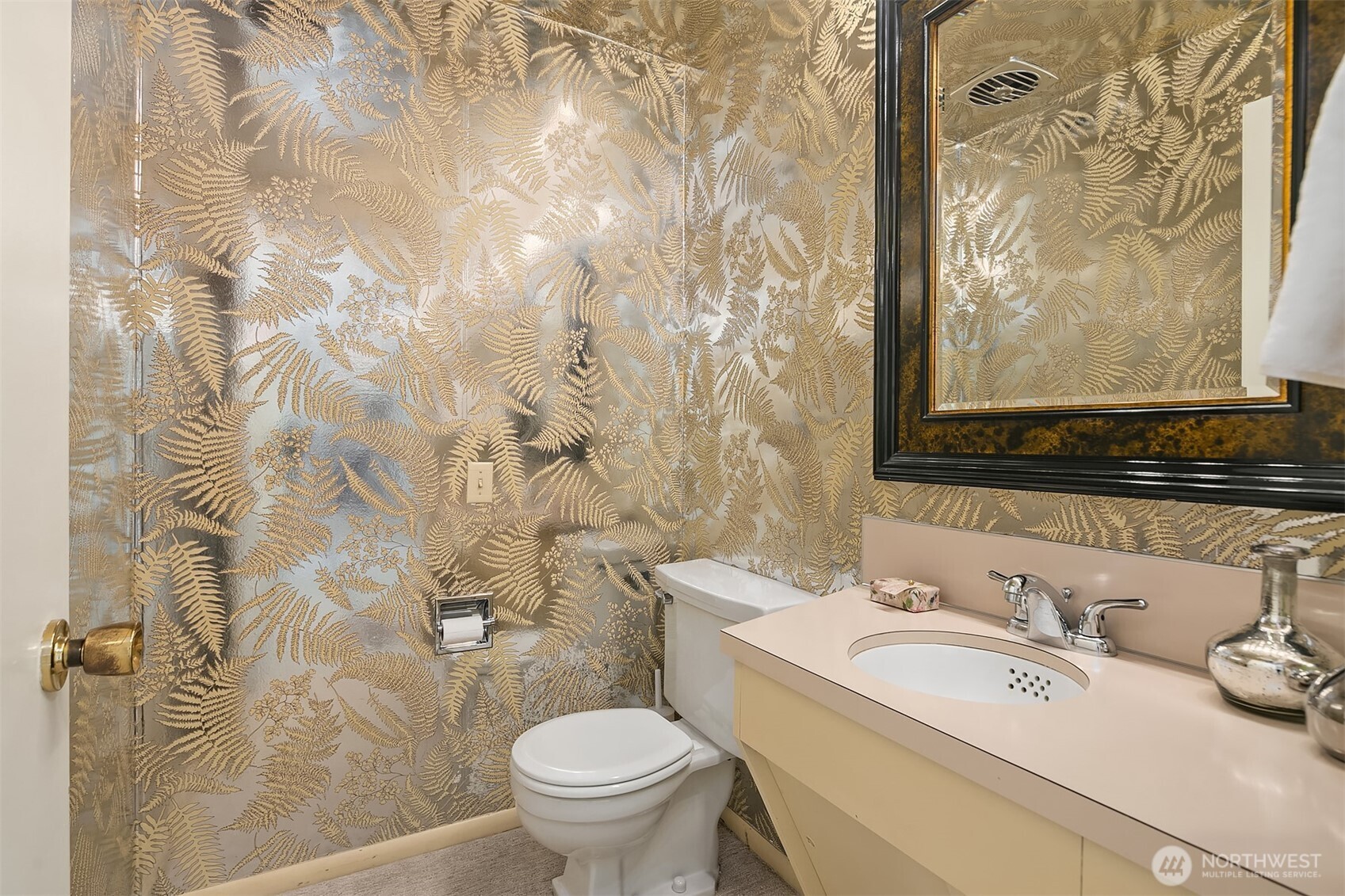6555 Northeast Windermere Road Seattle, WA 98105 - Photo 18 of 38 a bathroom with a sink and a mirror