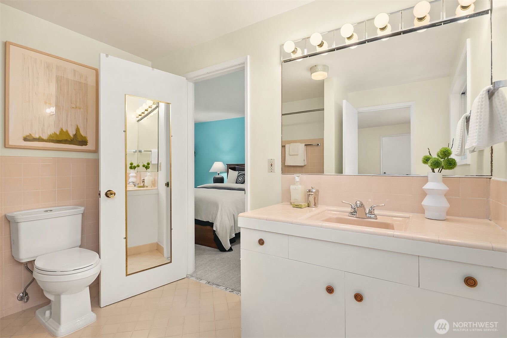 6555 Northeast Windermere Road Seattle, WA 98105 - Photo 25 of 38 a bathroom with a toilet a sink and a mirror