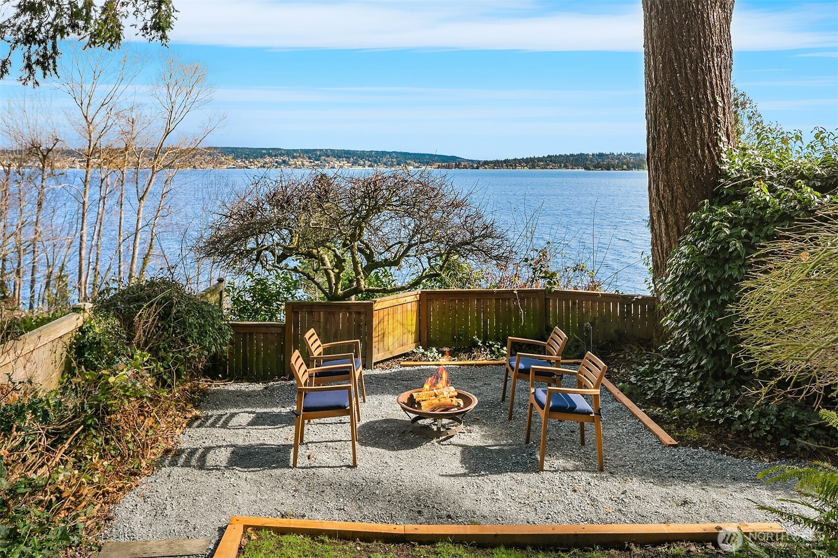 6555 Northeast Windermere Road Seattle, WA 98105 - Photo 32 of 38 a view of a roof deck with couches and wooden floor