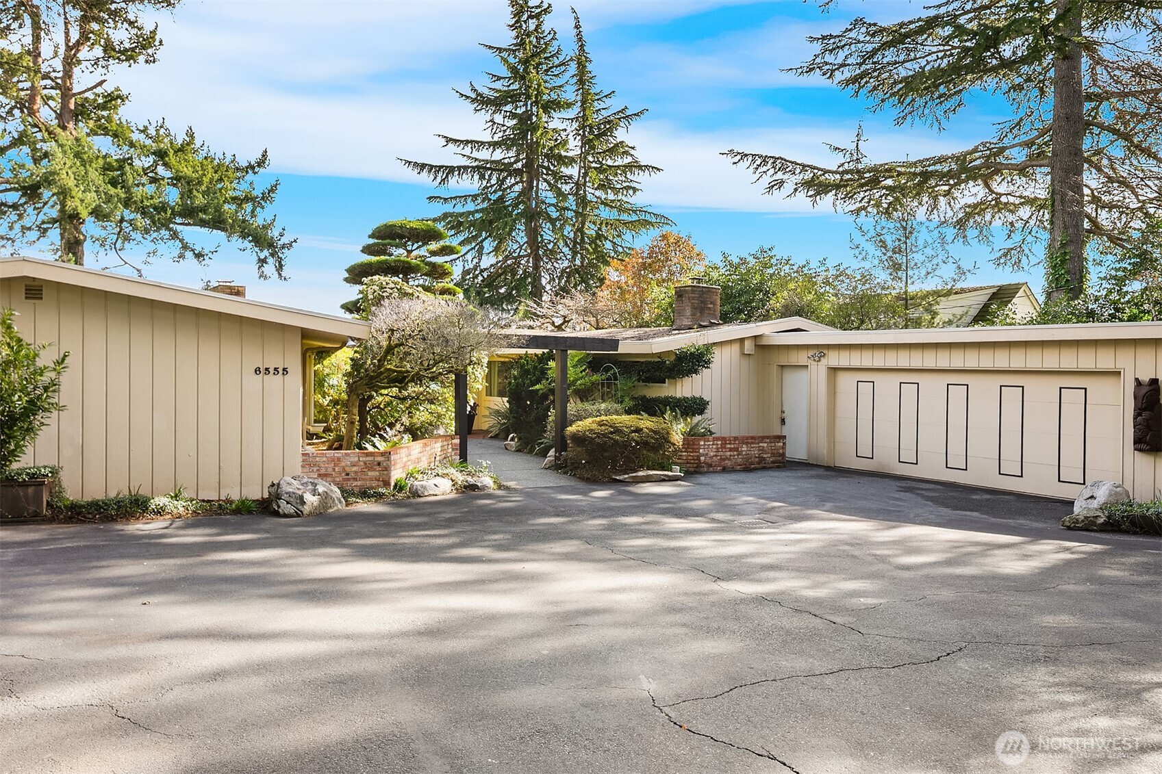 6555 Northeast Windermere Road Seattle, WA 98105 - Photo 38 of 38 a view of a house with a patio
