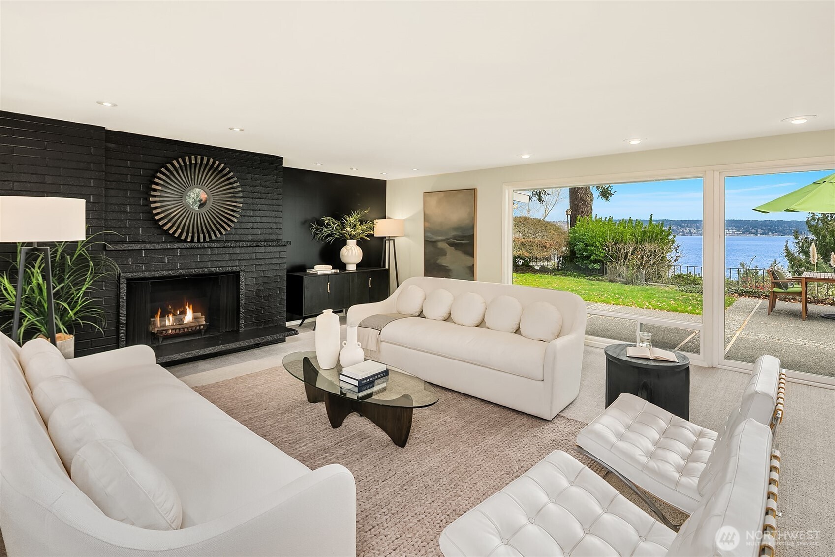 6555 Northeast Windermere Road Seattle, WA 98105 - Photo 5 of 38 a living room with furniture and a fireplace