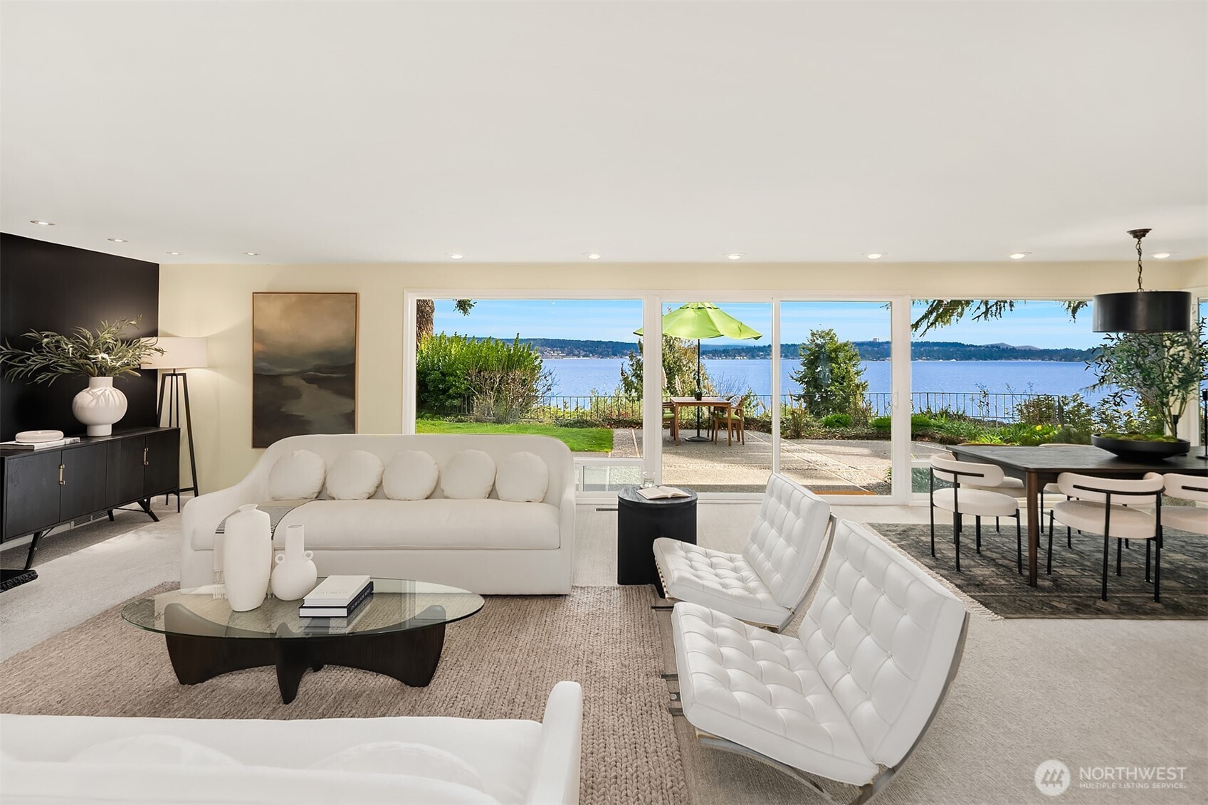 6555 Northeast Windermere Road Seattle, WA 98105 - Photo 6 of 38 a living room with furniture and a large window