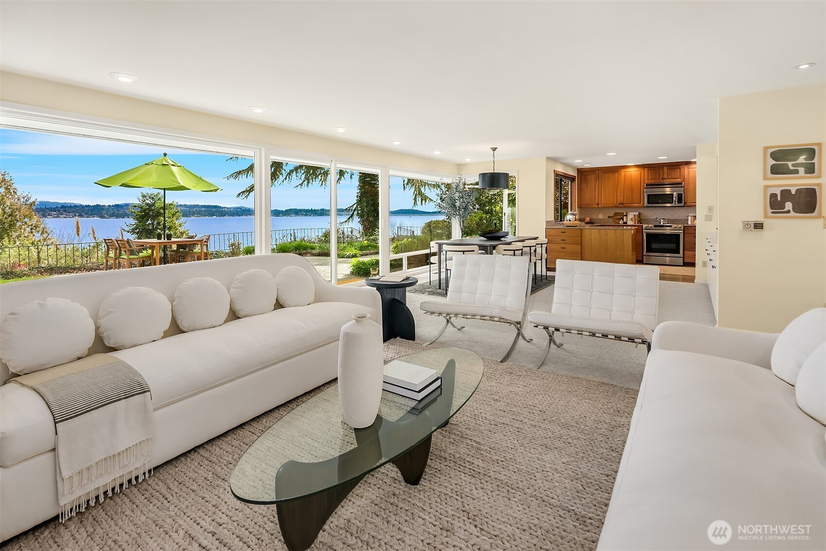 6555 Northeast Windermere Road Seattle, WA 98105 - Photo 8 of 38 a living room with furniture and a flat screen tv