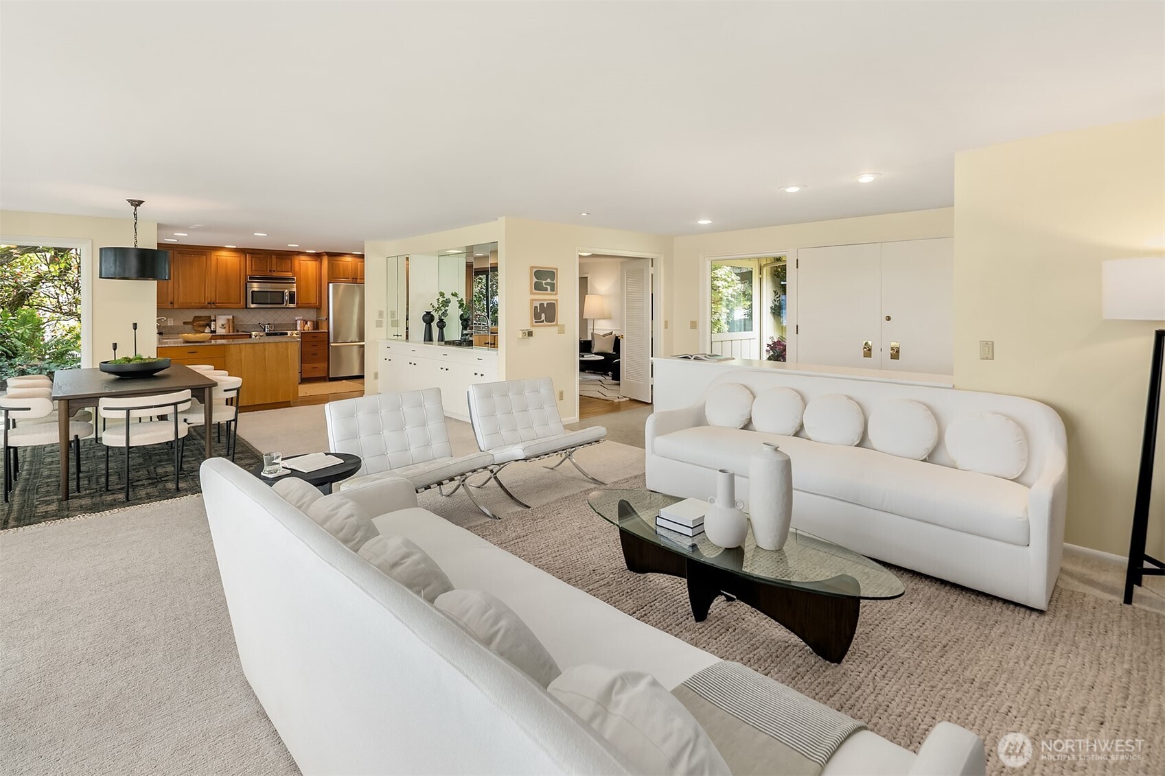 6555 Northeast Windermere Road Seattle, WA 98105 - Photo 9 of 38 a living room with furniture and a large window