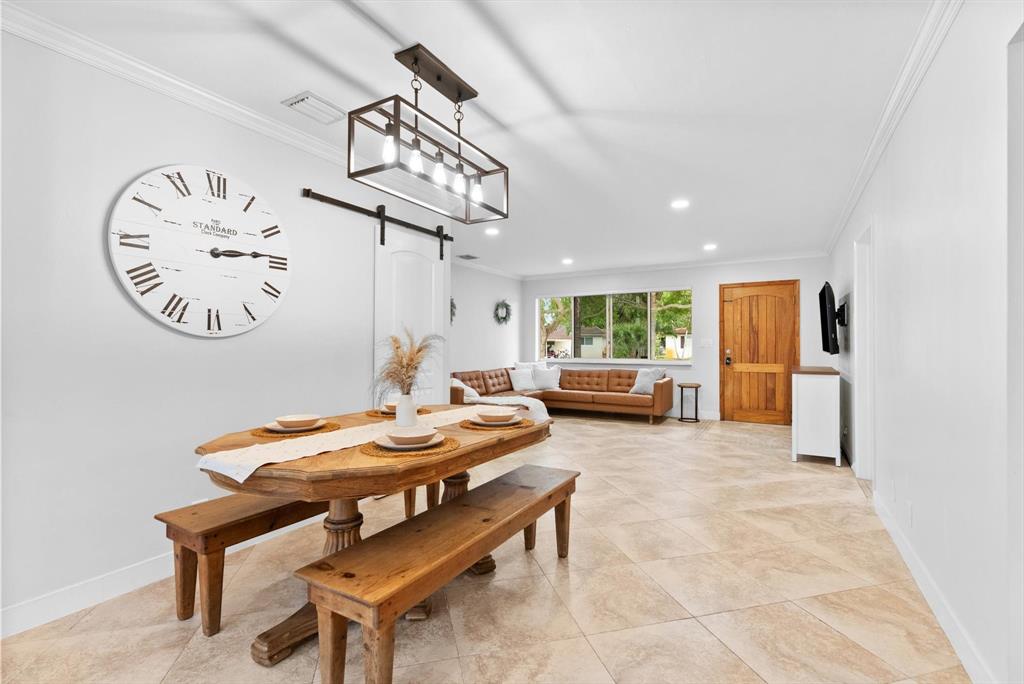 1257 Northwest 5th Street Boca Raton, FL 33486 - Photo 11 of 44 a view of a room with furniture and a clock