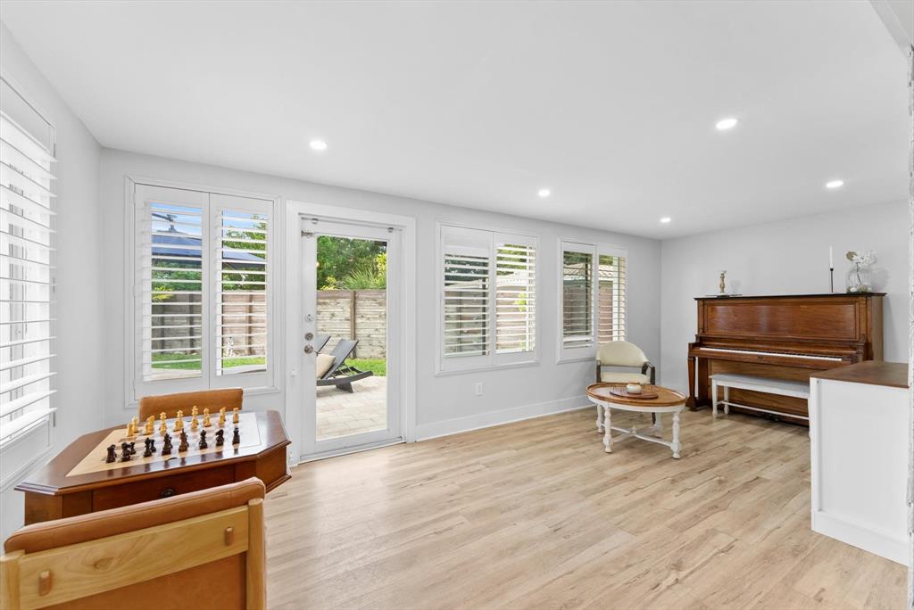 1257 Northwest 5th Street Boca Raton, FL 33486 - Photo 12 of 44 a living room with furniture and a flat screen tv