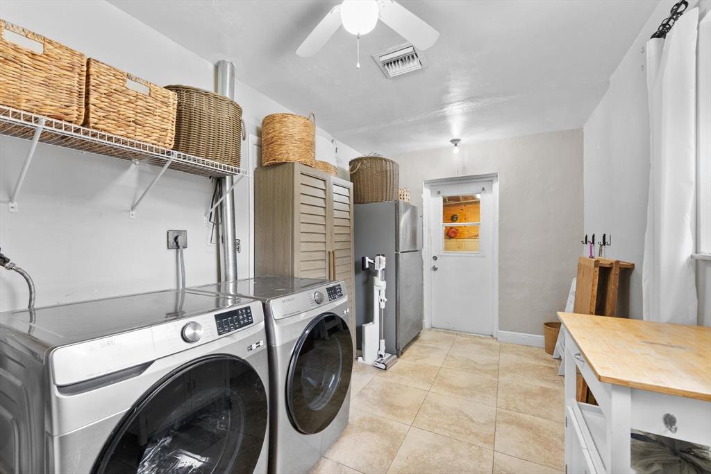 1257 Northwest 5th Street Boca Raton, FL 33486 - Photo 30 of 44 a view of a room with washer and dryer