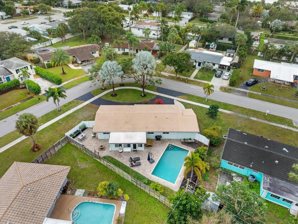 1257 Northwest 5th Street Boca Raton, FL 33486 - Photo 39 of 44 an aerial view of a house with a garden and lake view