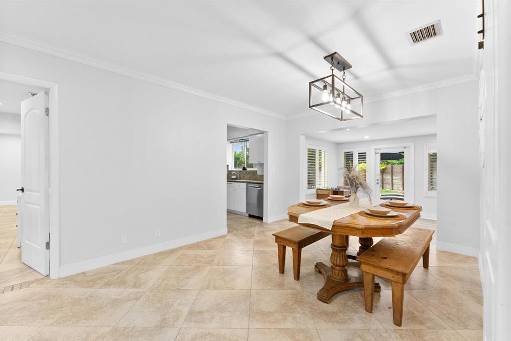 1257 Northwest 5th Street Boca Raton, FL 33486 - Photo 10 of 44 a dining room with furniture and window