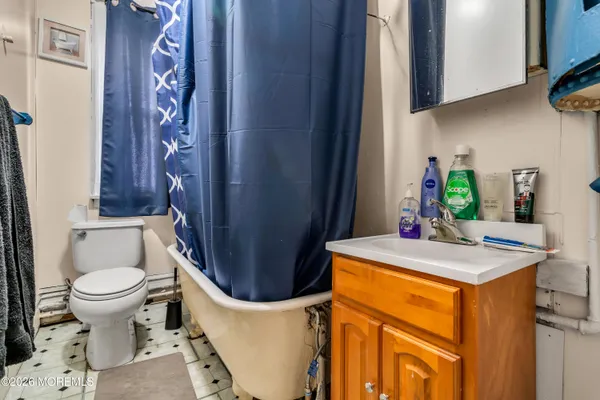 a room with furniture and a flat screen tv