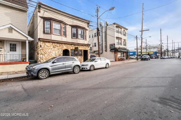 a view of a cars parked in front of a building