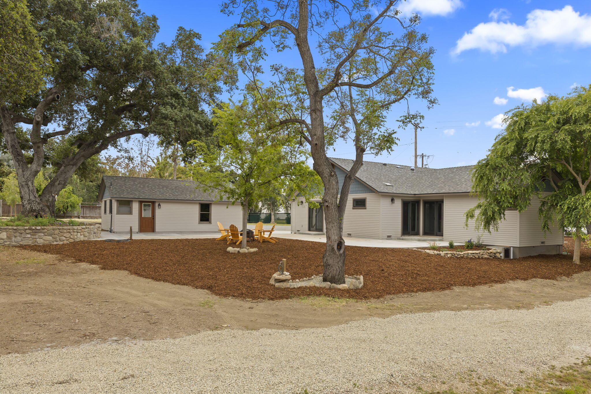 350 Old Grade Road Oak View, CA 93022 - Photo 12 of 59 a front view of a house with a yard and garage