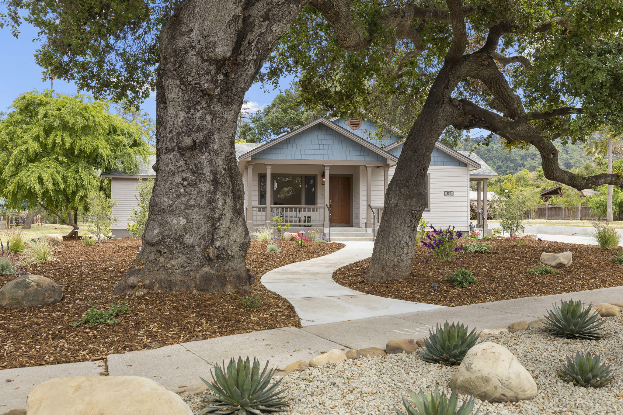 350 Old Grade Road Oak View, CA 93022 - Photo 2 of 59 a front view of a house with a yard