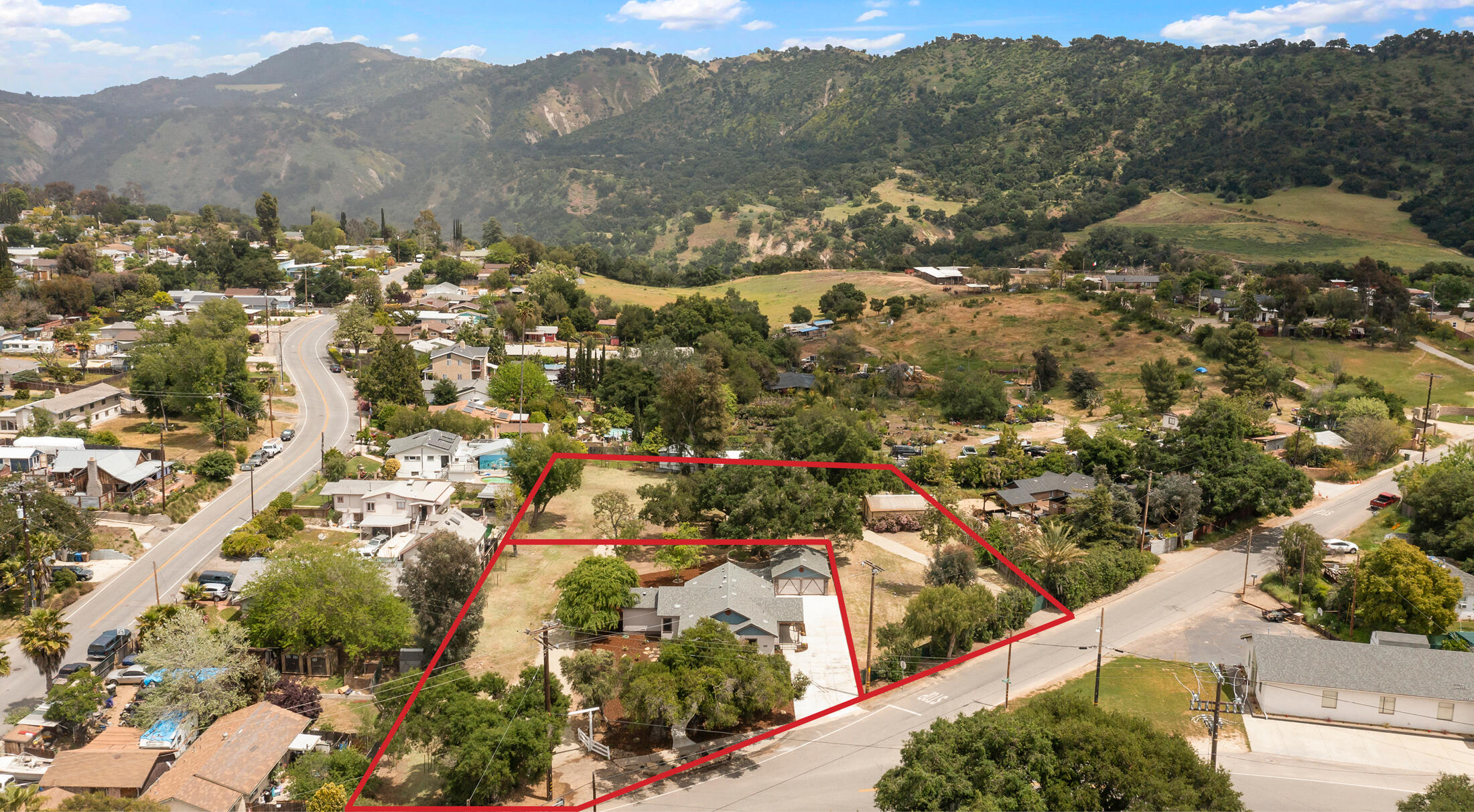 350 Old Grade Road Oak View, CA 93022 - Photo 3 of 59 an aerial view of mountain with residential house and green space