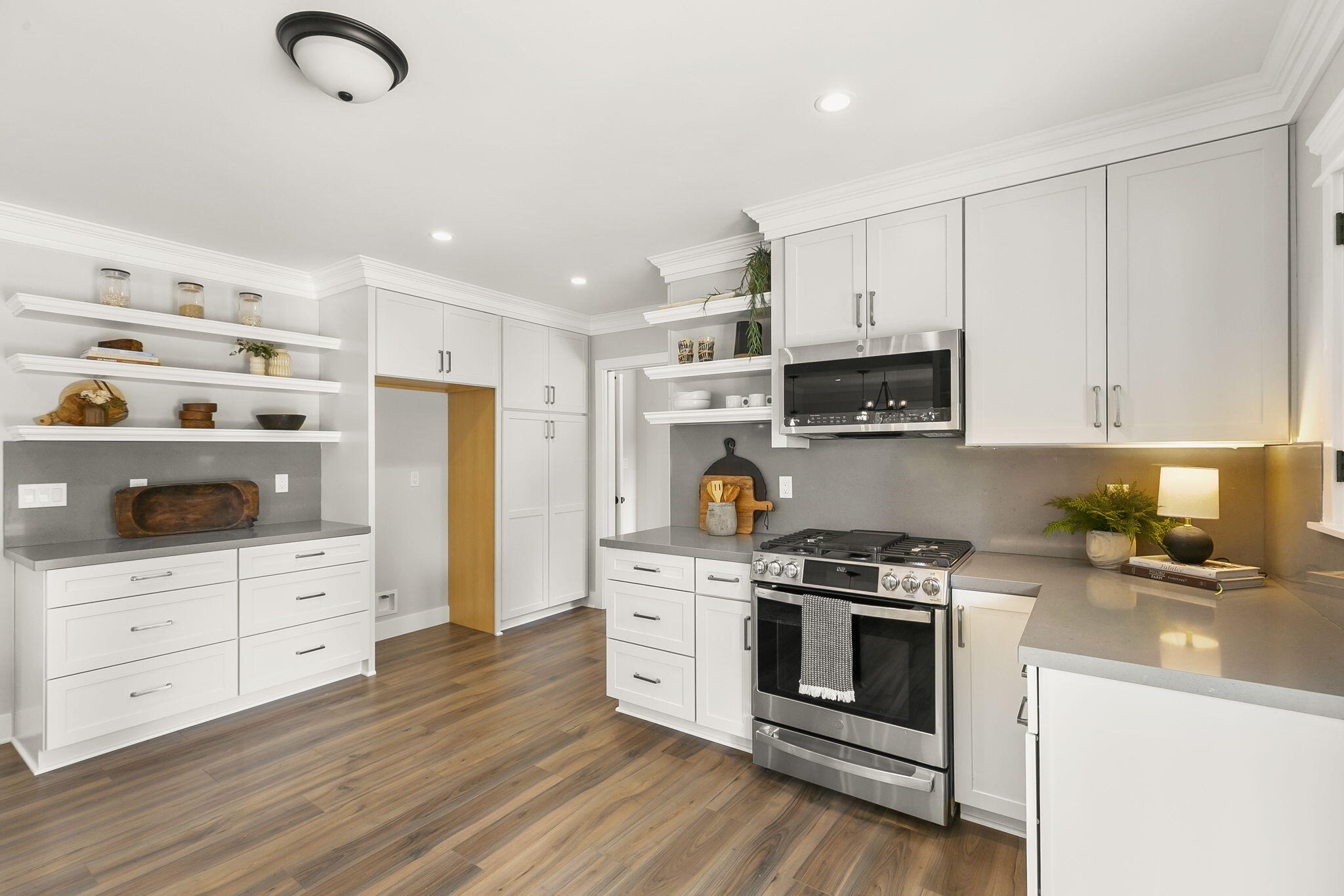 350 Old Grade Road Oak View, CA 93022 - Photo 31 of 59 a kitchen with stainless steel appliances white cabinets and a refrigerator