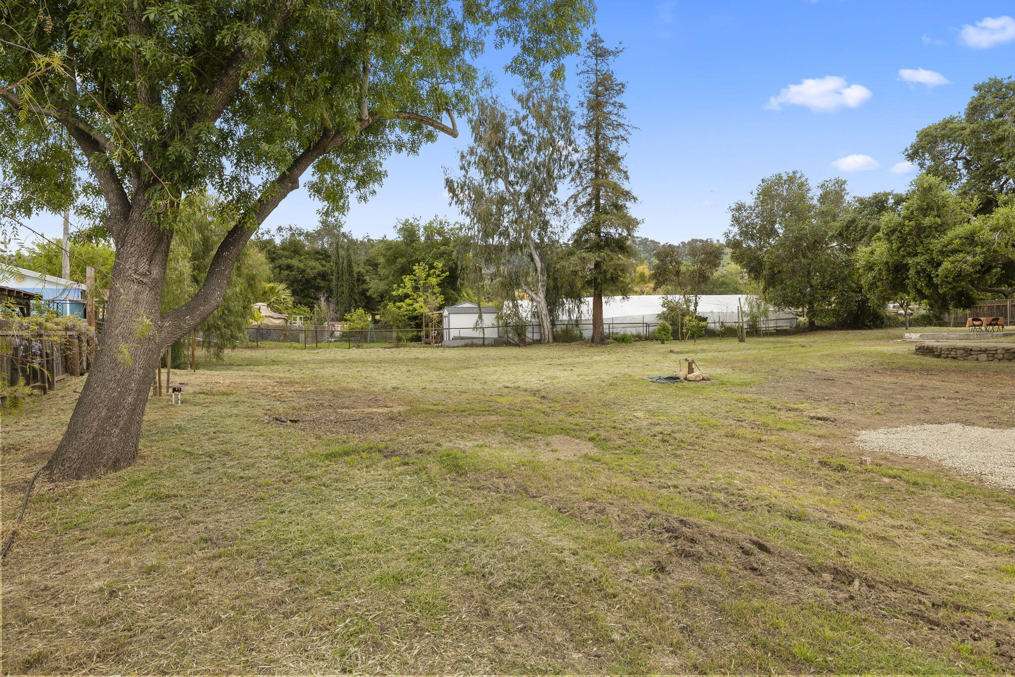 350 Old Grade Road Oak View, CA 93022 - Photo 48 of 59 a view of a field with trees in the background
