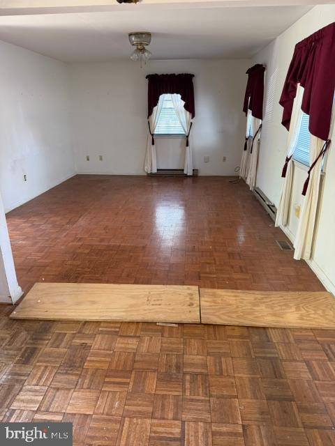 106 Fischer Road Grasonville, MD 21638 - Photo 5 of 8 a view of a room with wooden floor and furniture