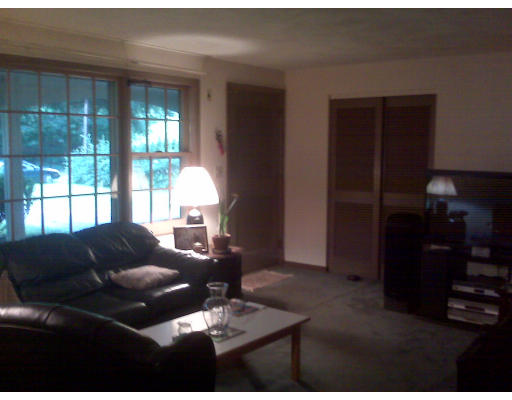 3 Santa Fe Road Chelmsford, MA 01824 - Photo 3 of 8 a living room with furniture and a window