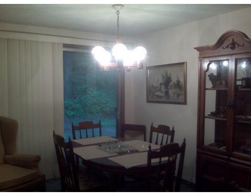3 Santa Fe Road Chelmsford, MA 01824 - Photo 6 of 8 a view of a dining room with furniture and wooden floor