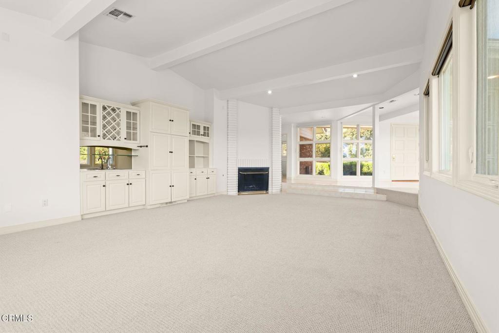 13922 Foothill Road Santa Paula, CA 93060 - Photo 13 of 36 an empty room with windows and entrance