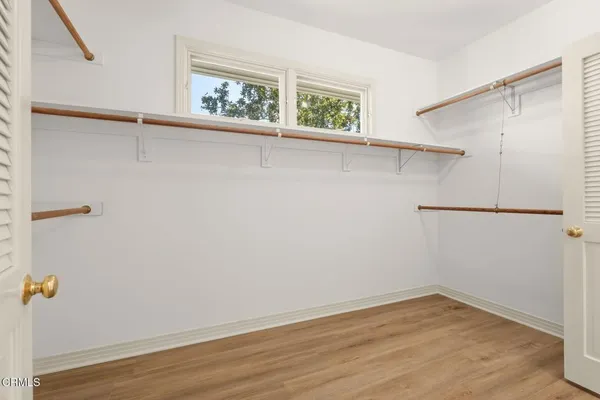 a view of a hallway with washer and dryer