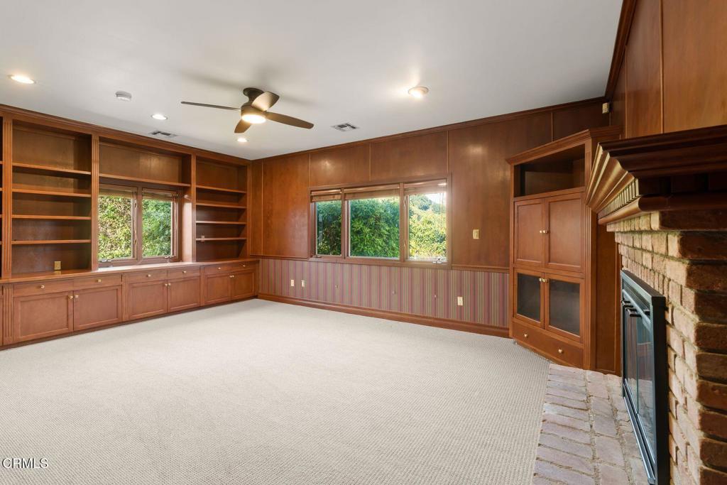 13922 Foothill Road Santa Paula, CA 93060 - Photo 9 of 36 a view of an empty room with a window and wooden floor